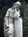 Stone Statue Grieving Woman