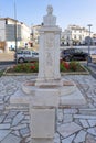 stone statue in honor of the doctor lourenÃ§o marcos crespo placed in a street in the center of the Alentejo town of Estremoz.