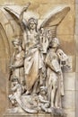 Stone statue of instrumental music , detail of the opera of Paris, France, side view