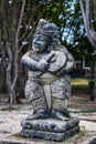 Stone statue near Pura Segara Desa Adat in Kuta, Bali