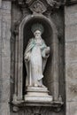 Stone statue of a saint, in the facade of Carmo church. Porto Royalty Free Stock Photo