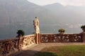 Stone statue on the shores of Lake Como in Italy