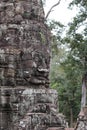 Stone statue, Bayon temple. Angkor Royalty Free Stock Photo