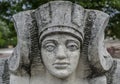 Stone statue of a woman with the face of the pharaoh