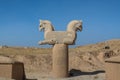 Stone statue of Zoomorphic griffin Twin Homa or Huma bird figures in the Persepolis in Shiraz, Iran. The ceremonial capital of