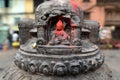 Stone statuette of sitting Buddha. Swayambhunath. Nepal