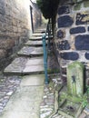 Stone steps in alley way with railing from seaside town uk