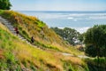 Stone steps down track up Mount Maunganui with view beyond to Pacific Ocean