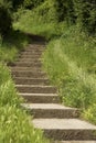 Stone steps leading up a hill sand point beach England uk