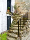 Stone steps leading up to residential door Royalty Free Stock Photo