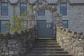 Stone steps leading upwards to stone archway Royalty Free Stock Photo