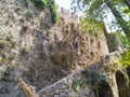 Stone steps near a well preserved stone city wall in the old city of Antalya in Turkey