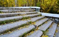 Stone steps of the old staircase in the city`s autumn park Royalty Free Stock Photo