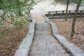 Stone steps in the woods on the monastery grounds Royalty Free Stock Photo