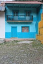 Stone street, colorful houses and ruins of the La Encarnacion foundry in Zimapan Hidalgo Mexico Royalty Free Stock Photo