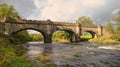 The stone Strid Foot Bridge across the River Wharfe in the Yorkshire Dales, England, UK Royalty Free Stock Photo