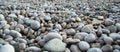 Textured background of stones, sea pebble on beach Royalty Free Stock Photo