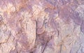 Stone texture background with unique pattern. Brown and purple rock texture. Rock surface abstract background. Natural stone Royalty Free Stock Photo