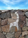 stone texture with camelid shape engraved on white stone. desert related image