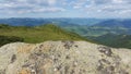 Stone texture for the lettering on the background of mountains and sky Royalty Free Stock Photo