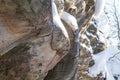 Stone texture in snow and ice. Mountain wall. Rock texture. Royalty Free Stock Photo