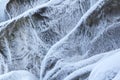 Stone texture in snow and ice. Mountain wall. Rock texture. Royalty Free Stock Photo