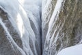 Stone texture in snow and ice. Mountain wall. Rock texture. Royalty Free Stock Photo