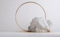 Minimalist Podium with Gold Ring and Natural Stone Royalty Free Stock Photo