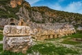 Stone theater faces and masks in Myra Ancient City. Ancient Myra Theater in background. Demre, Antalya Royalty Free Stock Photo