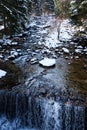 A stone threshold and a waterfall on the Lomnica River