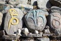 Stone with tibetian mantras Tibet sanscrit