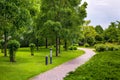 Stone tile walkway curve arcing in the park. Royalty Free Stock Photo