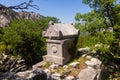 Stone tombs and sarcophagus termesos on sunny day. Northeast necropolis. Turkey