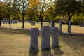 Stone tombstones in the German cemetery in the fall. Beautiful German cemetery near Kyiv. Many dead German soldiers of the dead Royalty Free Stock Photo