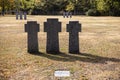 Stone tombstones in the German cemetery in the fall. Beautiful German cemetery near Kyiv. Many dead German soldiers of the dead Royalty Free Stock Photo