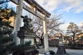 Stone Torii in front of Shinto Shrine