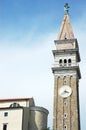 Stone tower with big watch