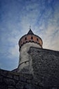 Silhouette of castle tower over blue sky Royalty Free Stock Photo