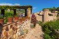Stone tower and flowers in Tossa de Mar Spain Royalty Free Stock Photo