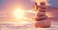 Stone tower. Natural pebble stone on the beach. Balancing body, mind, soul and spirit. Mental health.