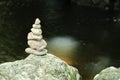 Stone tower rocks arranged at waterfall, Zen balance concept