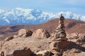 Stone tower on the top of hill in Ajt Bin Haddu, with a view of atlas mountains in the background