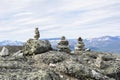 Stone towers on the rocks and mountain view on the background, Saana, Enontekio, Kilpisjarvi, Lapland, Finland Royalty Free Stock Photo