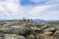 Stone towers on the rocks and mountain view on the background, Saana, Enontekio, Kilpisjarvi, Lapland, Finland