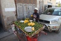 Stone town of Zanzibar, a man selling fruit Royalty Free Stock Photo