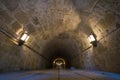 Stone tunnel with lights Royalty Free Stock Photo