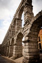 Stone two-storey bridge in the old part of the city. Royalty Free Stock Photo