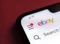 Stone / UK - July 14 2020: Ebay app seen on the corner of mobile phone with large logo, search bar and notification