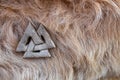 Stone valknut on Viking animal fur
