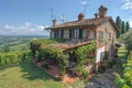 Stone Villa Amidst Rolling Hills with Vineyards Royalty Free Stock Photo